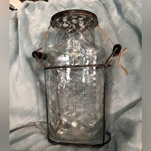 Glass vase with the metal top with holes for fresh flowers, handles are wood
